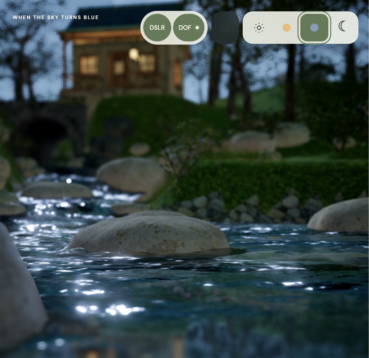 Blue hour on the estate: a creek over smooth stones, a lit cottage on the hill behind